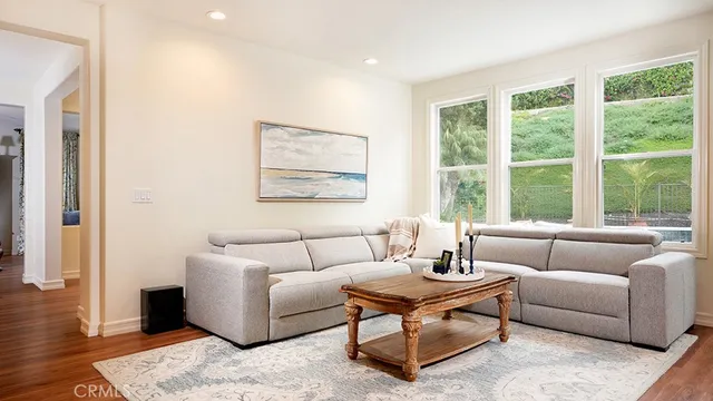 a bed room with a bed and a tv