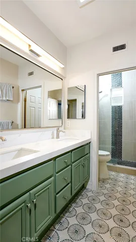 a view of swimming pool with seating area and trees around