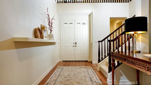 a living room with a piano and a piano