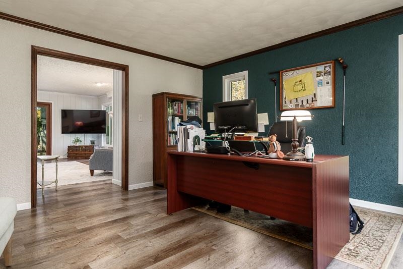 11948 Southgate Road Roscoe, IL 61073 - Photo 13 of 73 a room with furniture and a flat screen tv