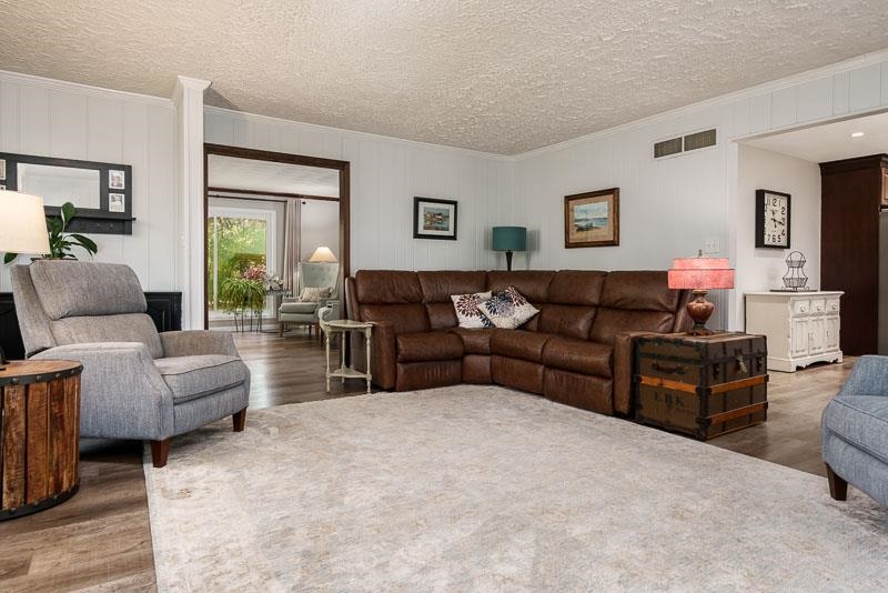 11948 Southgate Road Roscoe, IL 61073 - Photo 16 of 73 a living room with furniture and a couch
