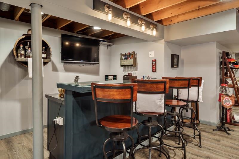 11948 Southgate Road Roscoe, IL 61073 - Photo 42 of 73 a view of a dining room with furniture and wooden floor