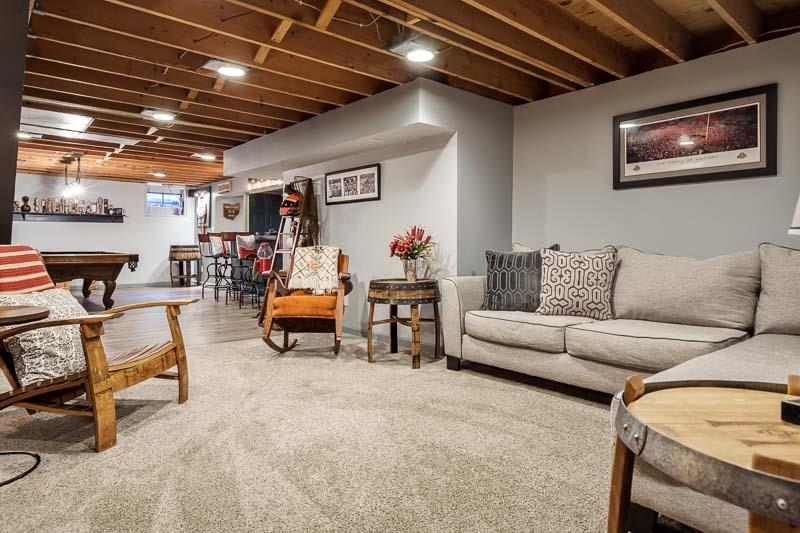 11948 Southgate Road Roscoe, IL 61073 - Photo 46 of 73 a living room with furniture and a table