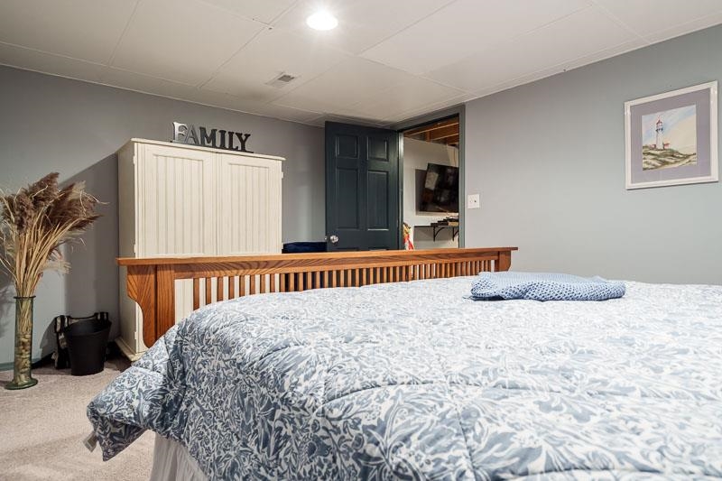 11948 Southgate Road Roscoe, IL 61073 - Photo 48 of 73 a bedroom with a bed and a window