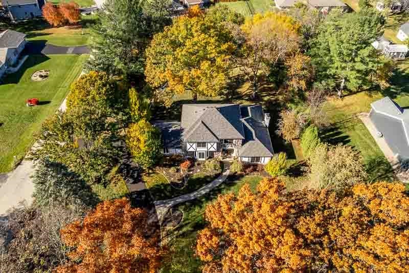 11948 Southgate Road Roscoe, IL 61073 - Photo 63 of 73 a aerial view of a house with a yard and wooden fence