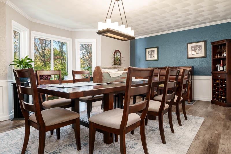 11948 Southgate Road Roscoe, IL 61073 - Photo 7 of 73 a view of a dining room with furniture window and wooden floor