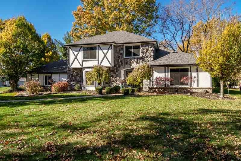 11948 Southgate Road Roscoe, IL 61073 - Photo 72 of 73 a front view of a house with garden