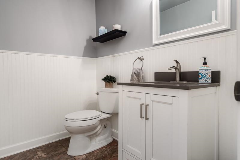 11948 Southgate Road Roscoe, IL 61073 - Photo 9 of 73 a bathroom with a toilet and a sink