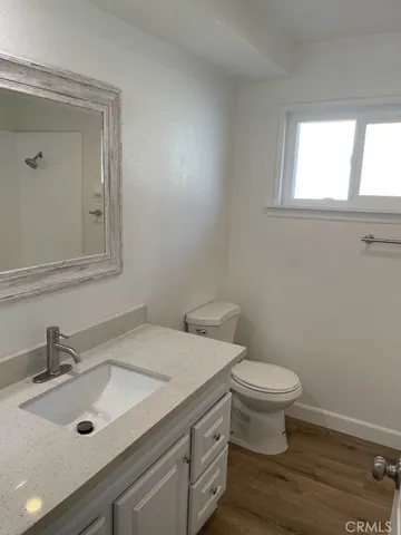 a bathroom with a sink and a toilet