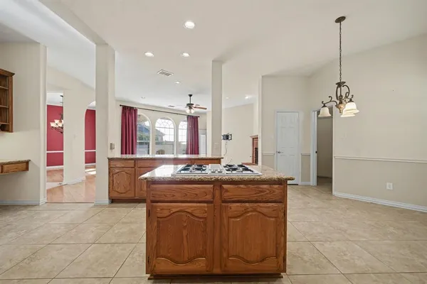 a kitchen with stainless steel appliances granite countertop a sink and a cabinets