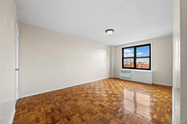 a view of an empty room and window