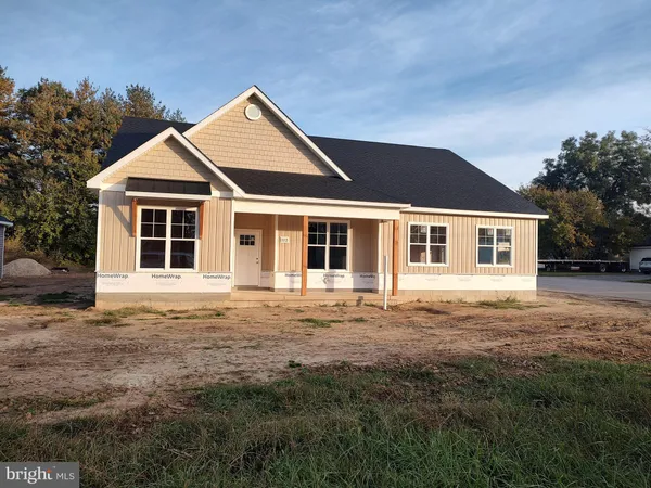 front view of a house with a garden