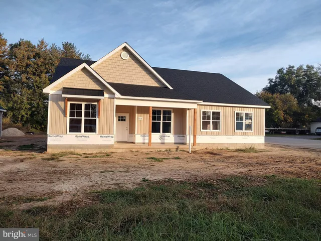 front view of a house with a garden