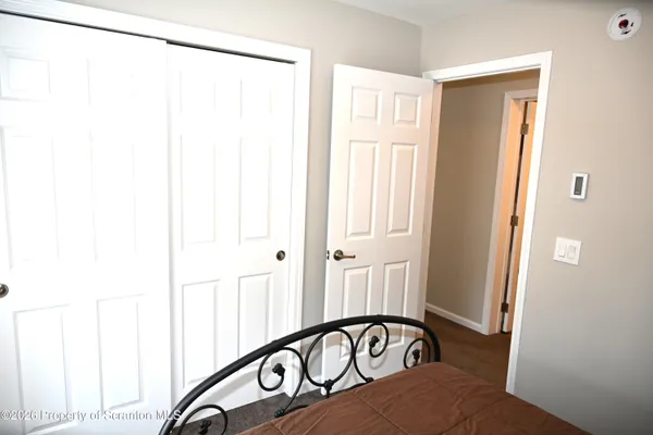 a view of a hallway with a window