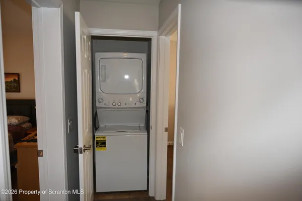 a view of a bathroom from a hallway