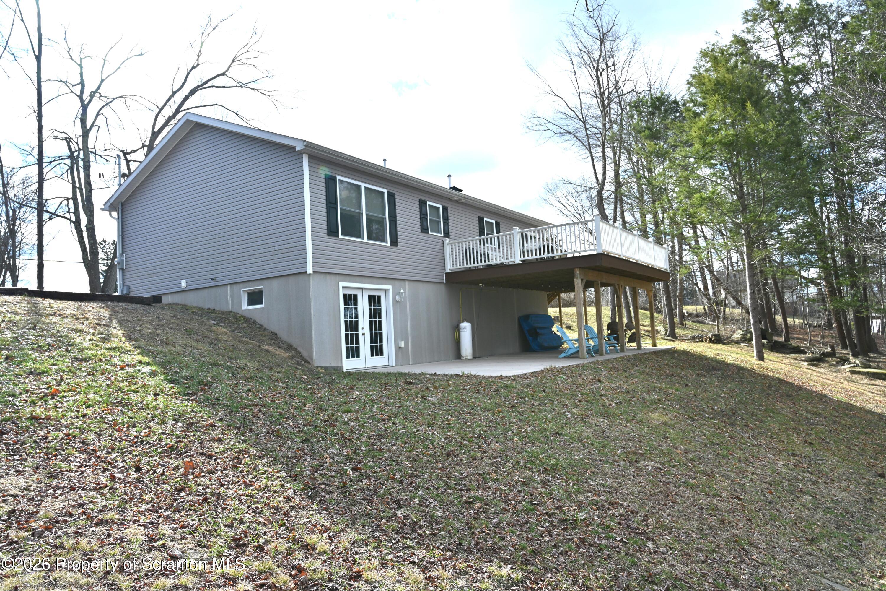 1143 Highway 29 Springville, PA 18844 - Photo 27 of 44 a view of a house with a yard