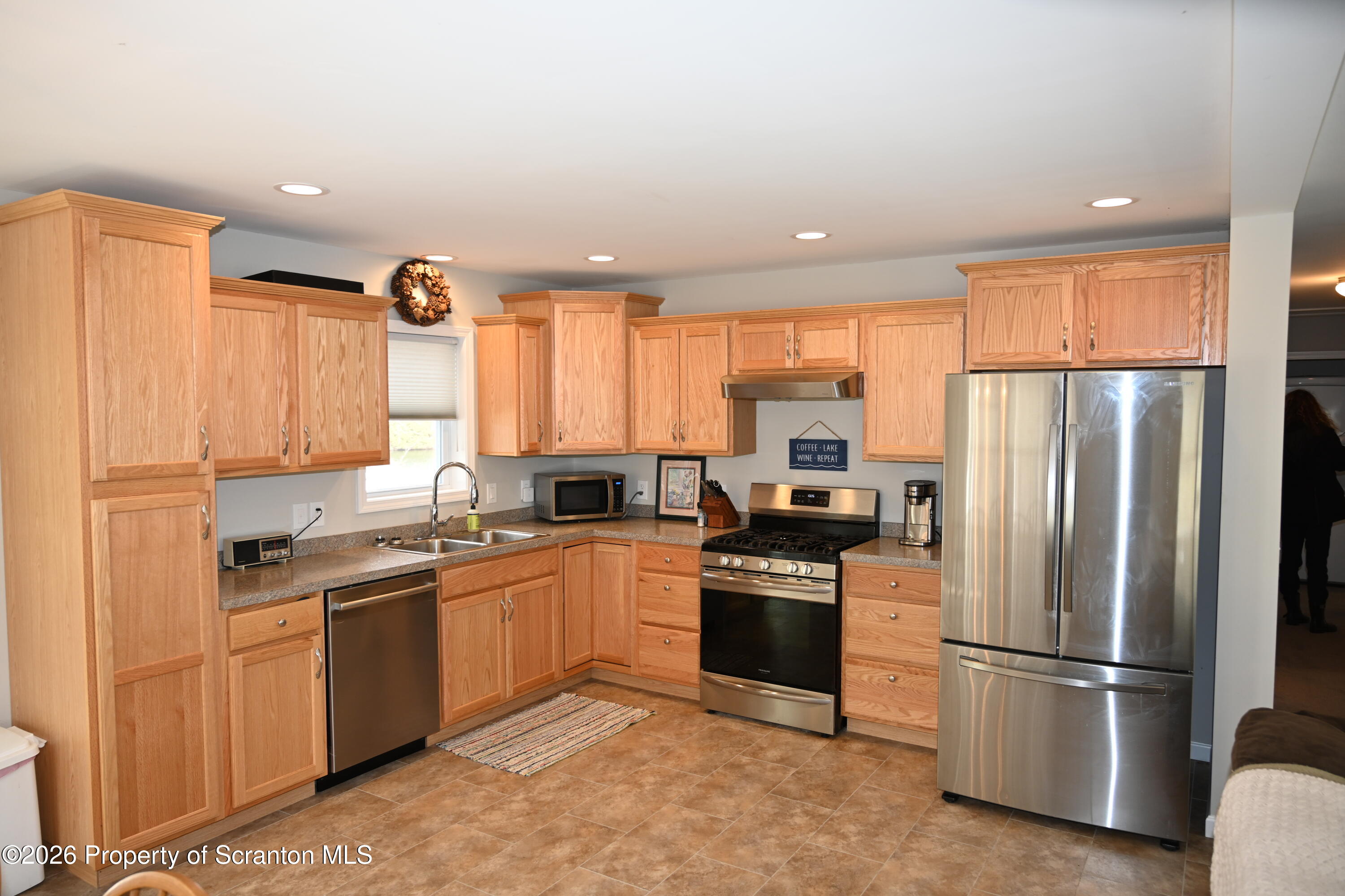 1143 Highway 29 Springville, PA 18844 - Photo 3 of 44 a kitchen with a sink appliances and cabinets