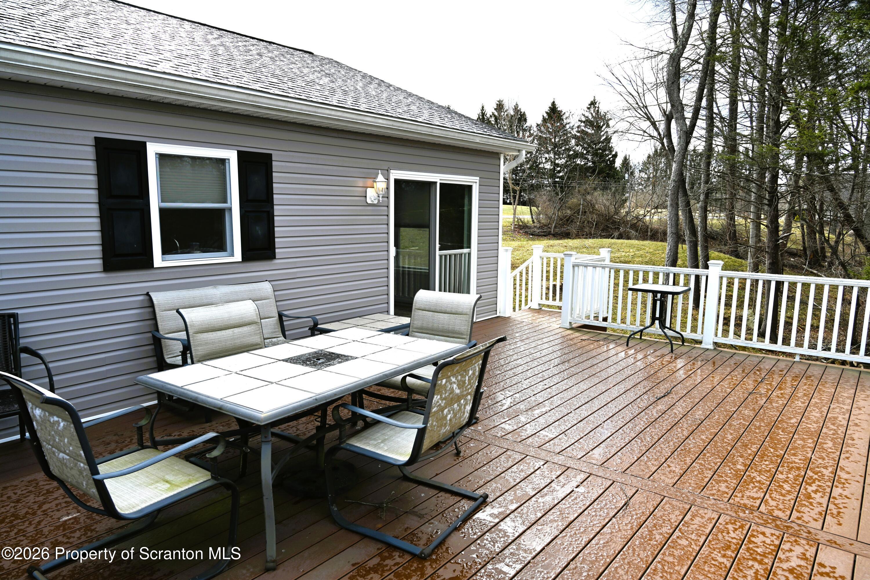 1143 Highway 29 Springville, PA 18844 - Photo 33 of 44 a view of a wooden chairs on the deck