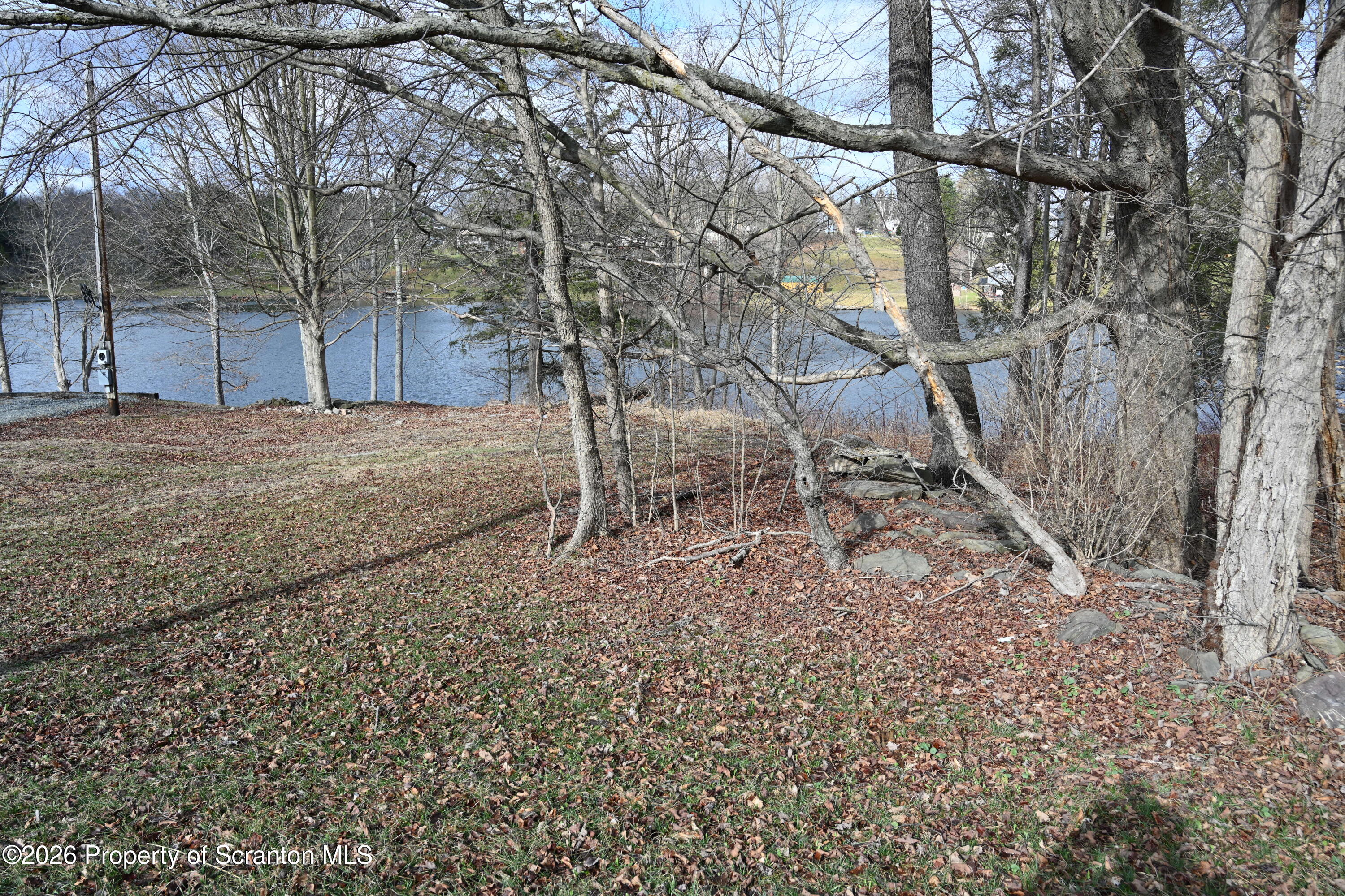 1143 Highway 29 Springville, PA 18844 - Photo 36 of 44 a backyard of a house with lots of green space