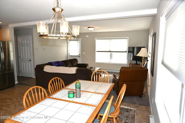 a view of a dining room with furniture