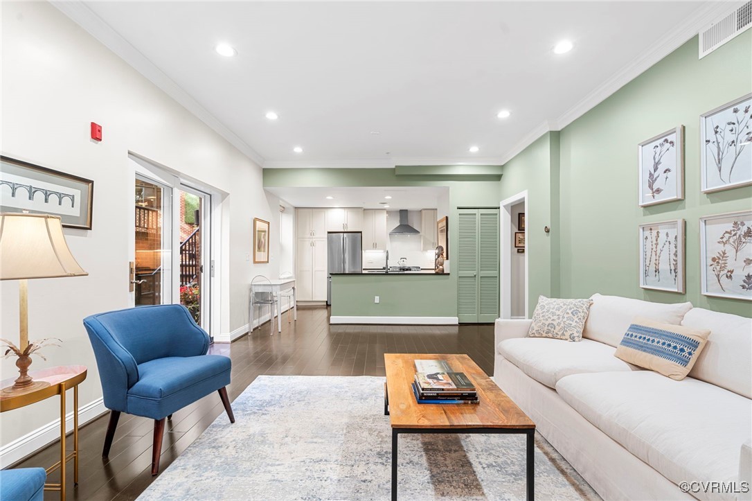 413 Stuart Circle, Unit PLD Richmond, VA 23220 - Photo 11 of 47 a living room with furniture and a wooden floor