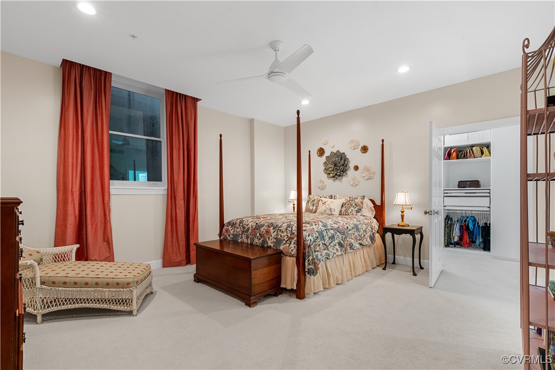 413 Stuart Circle, Unit PLD Richmond, VA 23220 - Photo 19 of 47 a bedroom with bed and a chandelier