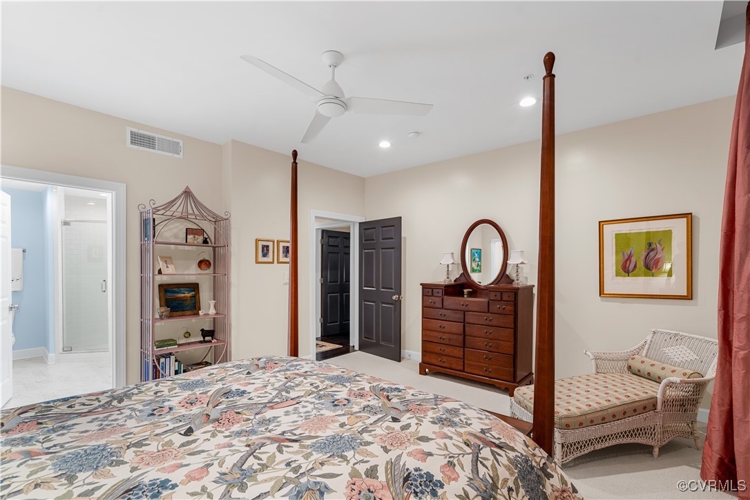 413 Stuart Circle, Unit PLD Richmond, VA 23220 - Photo 20 of 47 a bedroom with a bed and a dresser