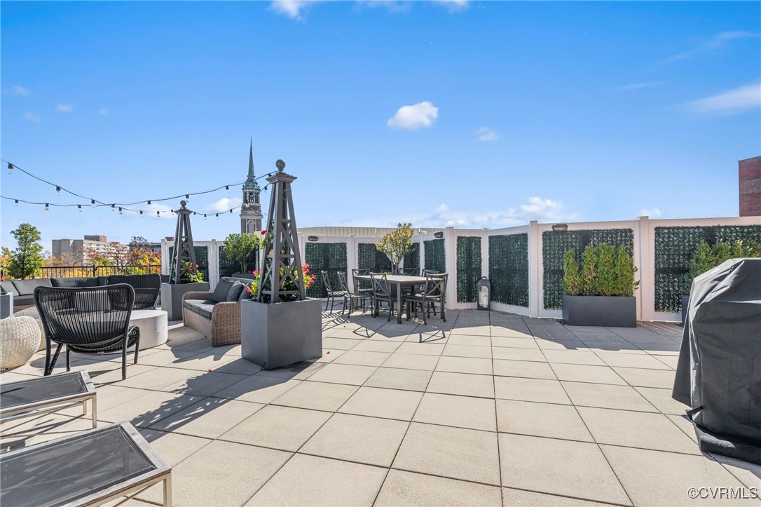 413 Stuart Circle, Unit PLD Richmond, VA 23220 - Photo 36 of 47 a view of a terrace with furniture