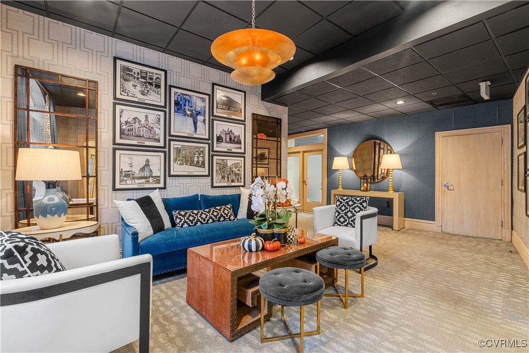 413 Stuart Circle, Unit PLD Richmond, VA 23220 - Photo 38 of 47 a living room with furniture a chandelier and a piano