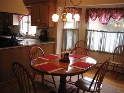 1110 Shore Road Pocasset, MA 02559 - Photo 8 of 17 a view of a dining room with furniture and window