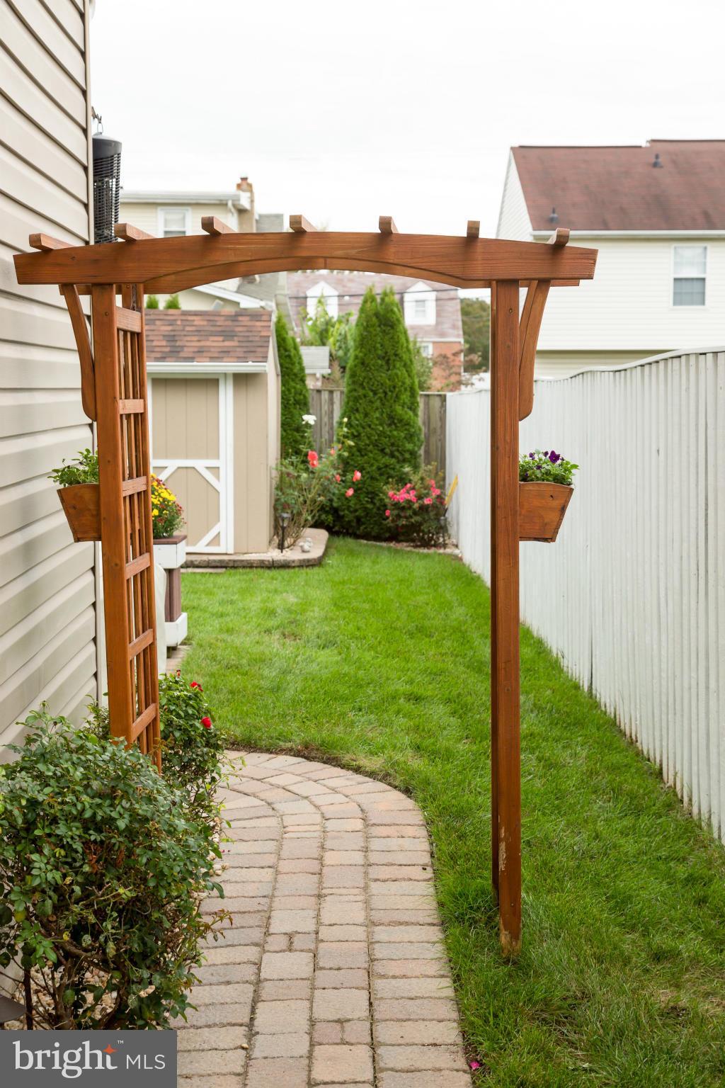 163 Roland Road Pasadena, MD 21122 - Photo 25 of 30 Side Walkway