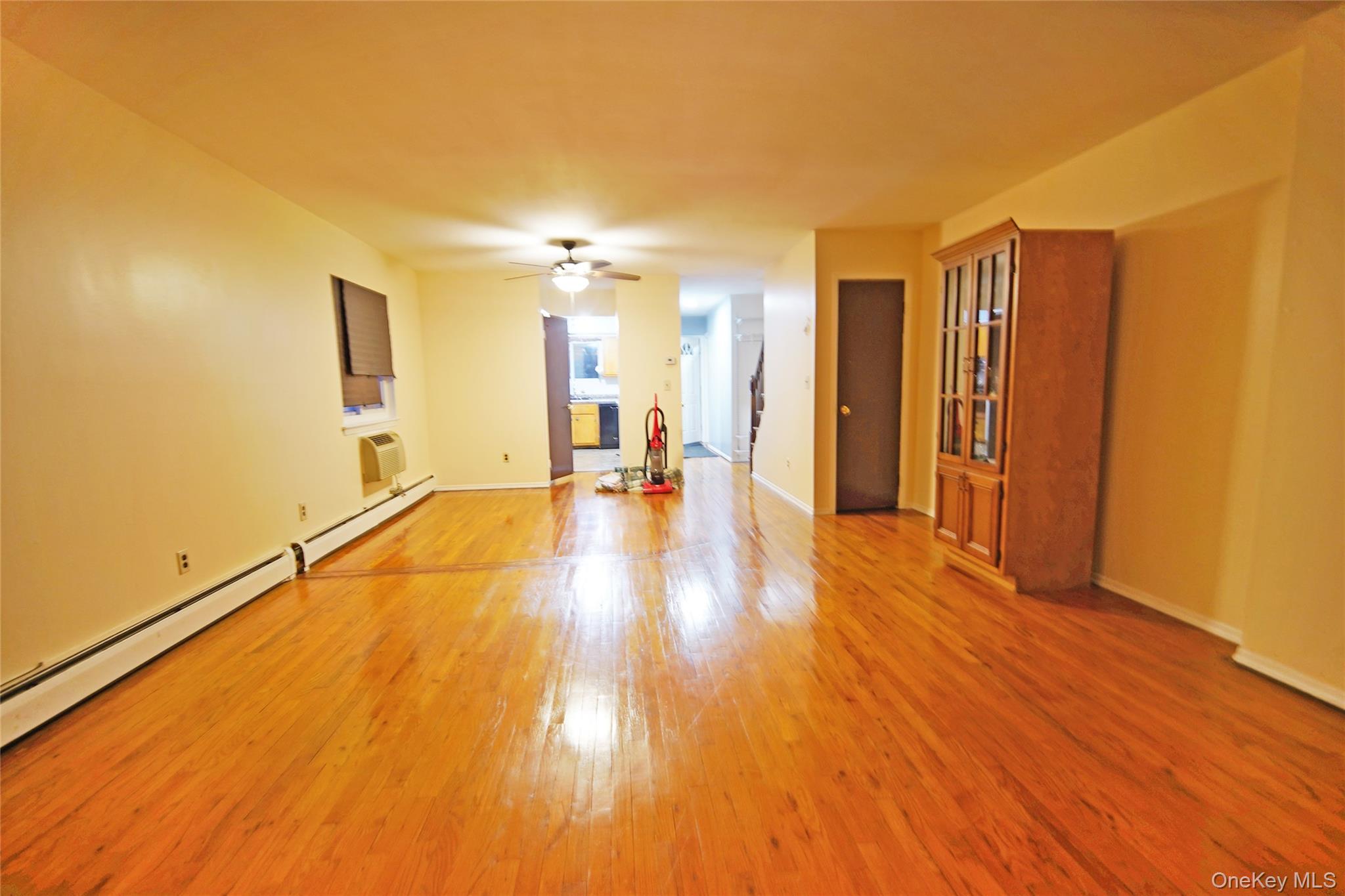 1280 Adee Avenue Bronx, NY 10469 - Photo 3 of 11 a view of a room with wooden floor