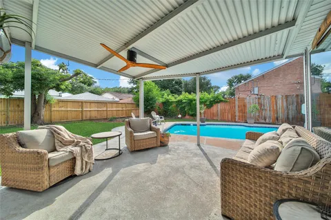 a outdoor living space with furniture and garden view