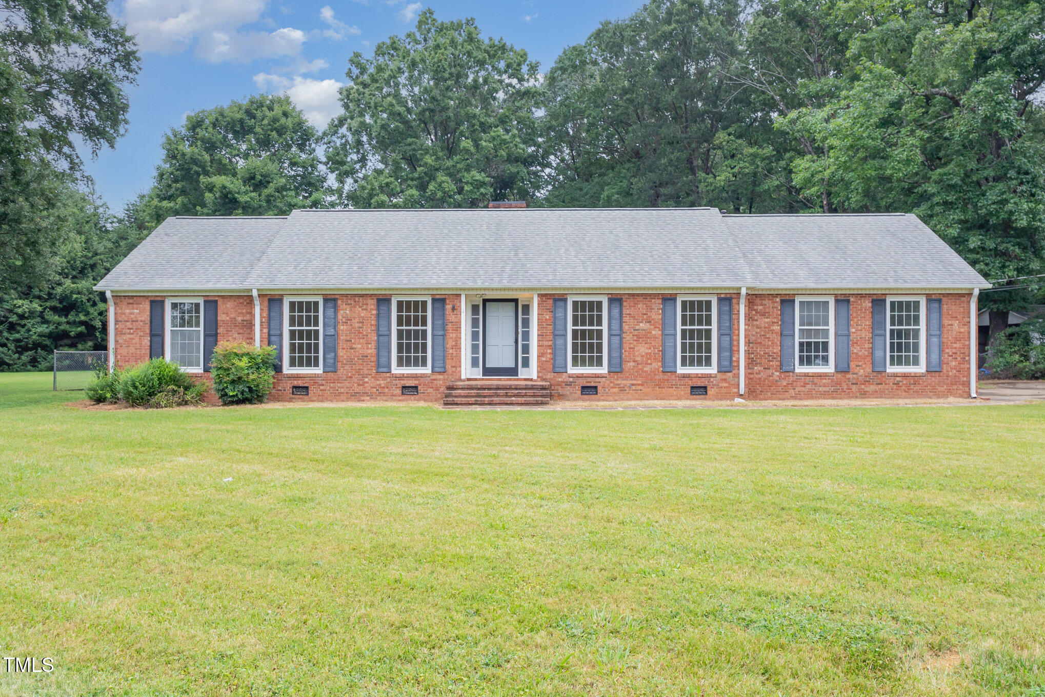 316 Cheeks Lane Graham, NC 27253 - Photo 1 of 52 a view of a yard in front of house