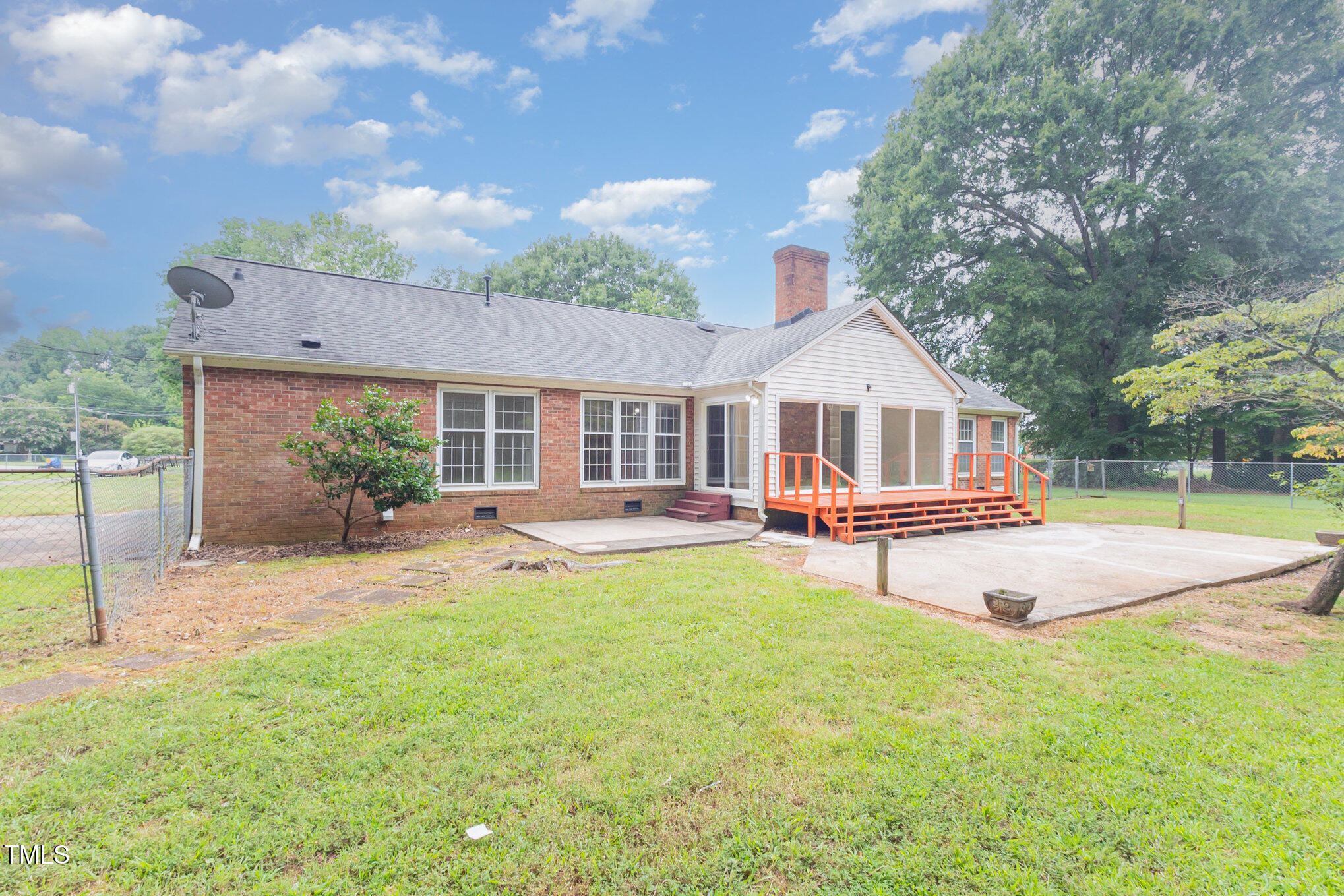316 Cheeks Lane Graham, NC 27253 - Photo 10 of 52 a view of house with a backyard porch and sitting area