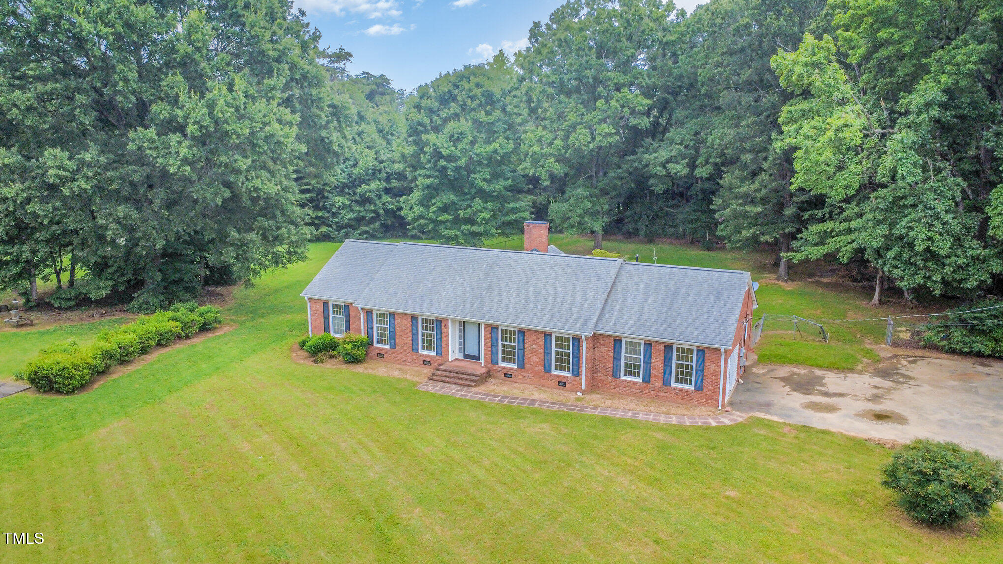 316 Cheeks Lane Graham, NC 27253 - Photo 12 of 52 a aerial view of a house with swimming pool next to a big yard
