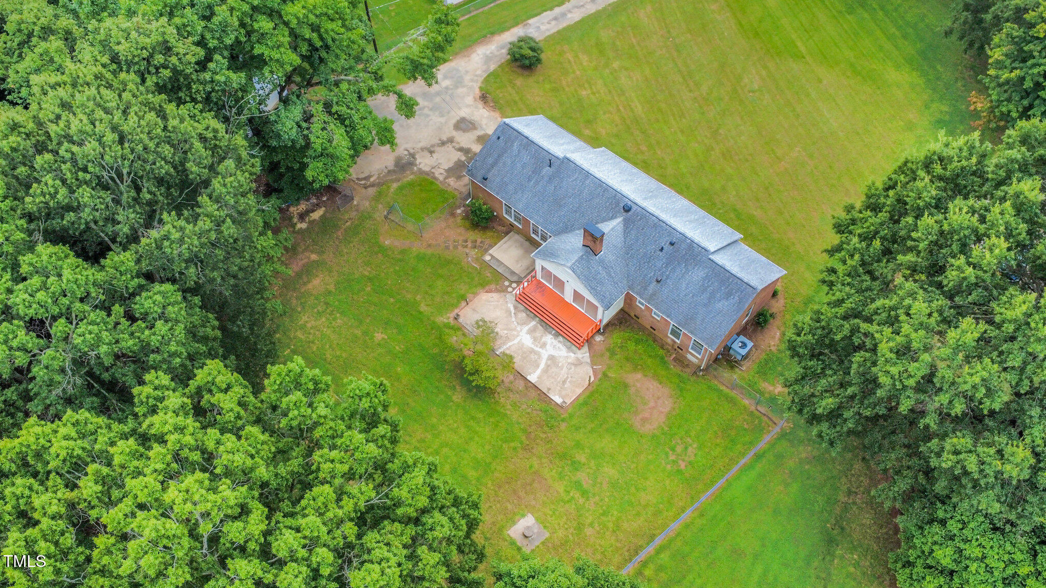 316 Cheeks Lane Graham, NC 27253 - Photo 13 of 52 an aerial view of residential house with outdoor space and trees all around