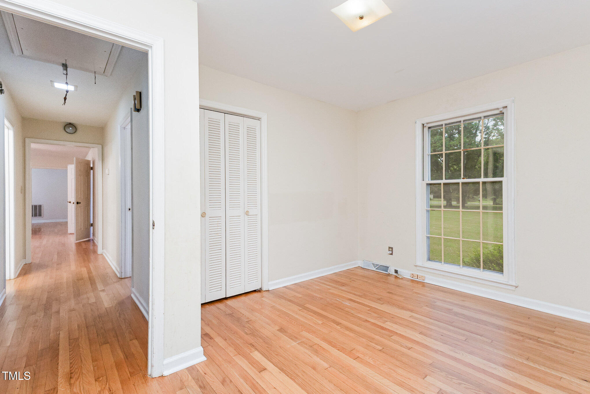 316 Cheeks Lane Graham, NC 27253 - Photo 37 of 52 a view of a room with wooden floor and windows