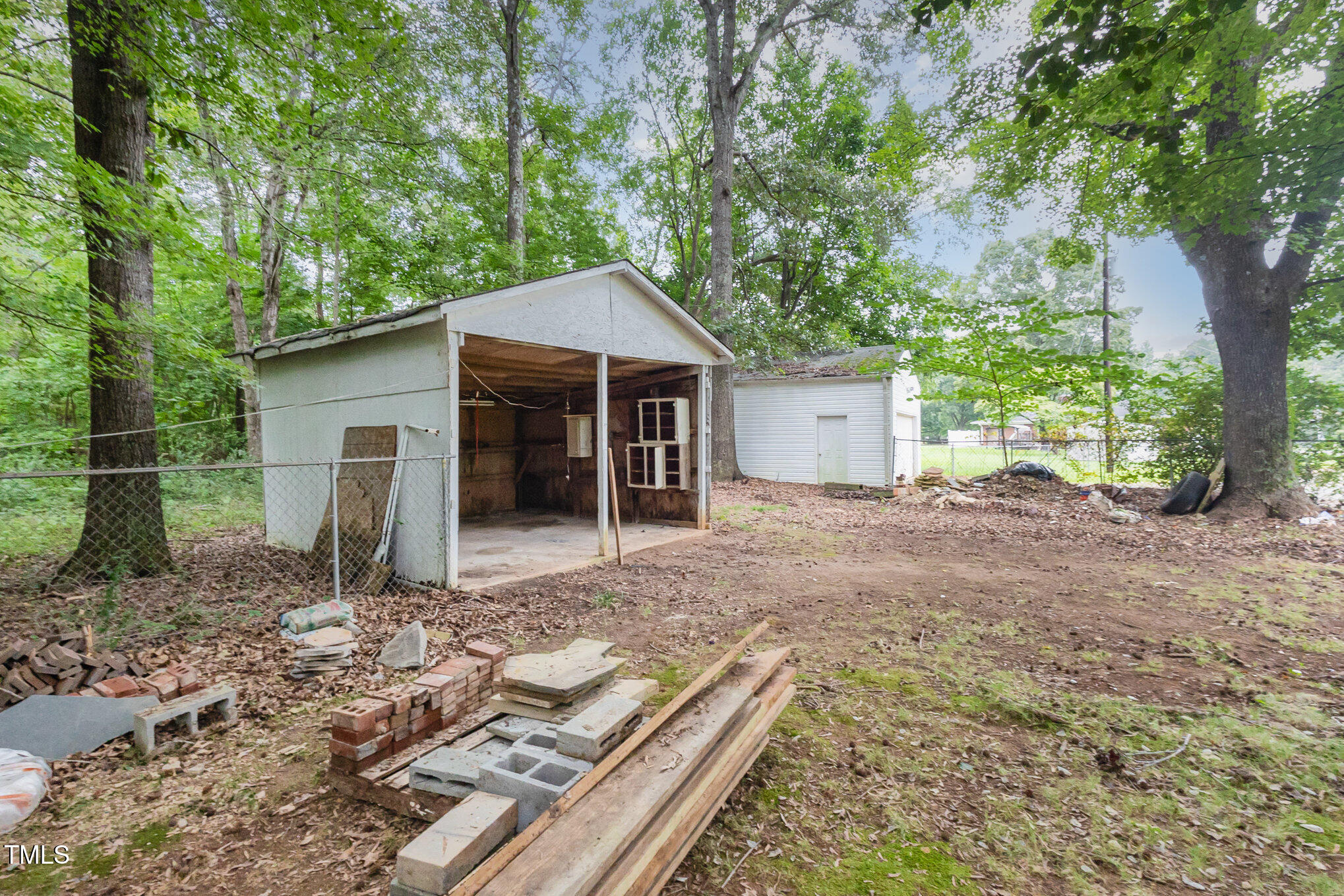 316 Cheeks Lane Graham, NC 27253 - Photo 45 of 52 a front view of a house with garden