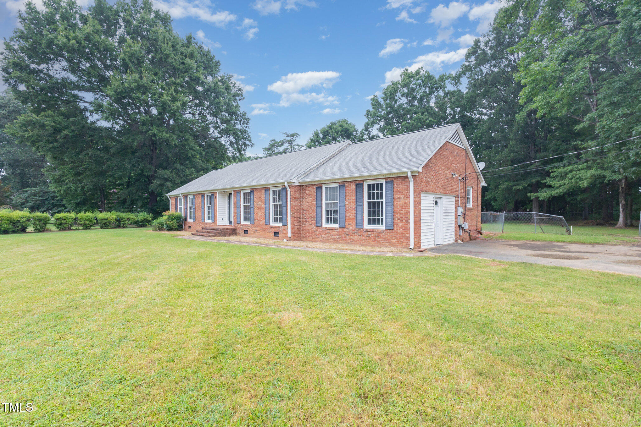316 Cheeks Lane Graham, NC 27253 - Photo 5 of 52 a view of a house with a backyard porch and sitting area