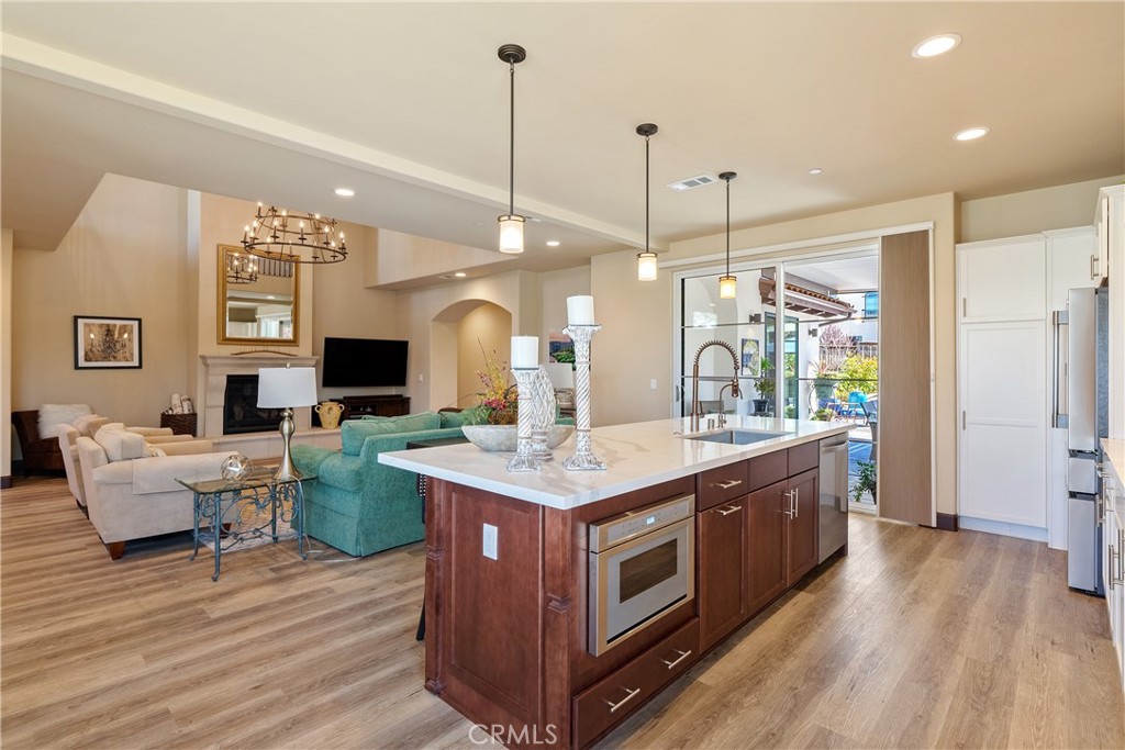 9300 Via Castillo Atascadero, CA 93422 - Photo 12 of 49 a open kitchen with stainless steel appliances granite countertop a stove and refrigerator