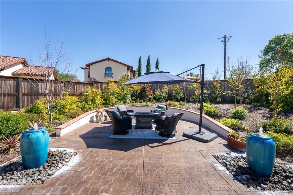 9300 Via Castillo Atascadero, CA 93422 - Photo 38 of 49 a view of a patio with couches chair and potted plants