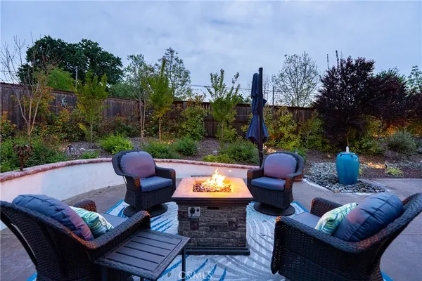 a outdoor living space with furniture and a garden