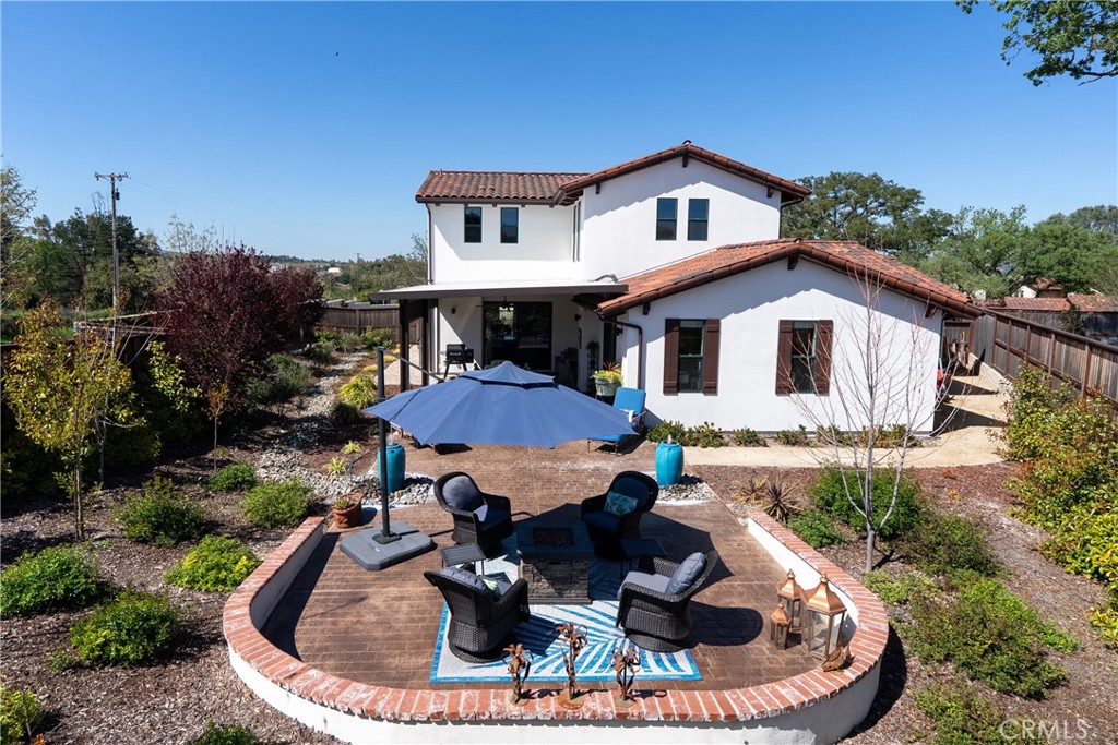 9300 Via Castillo Atascadero, CA 93422 - Photo 43 of 49 a view of a house with backyard sitting area and fire pit