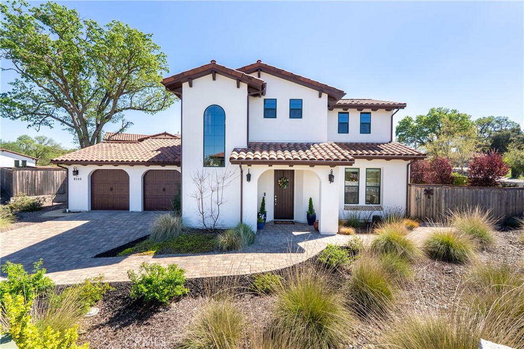 9300 Via Castillo Atascadero, CA 93422 - Photo 49 of 49 a front view of a house with a yard and garage