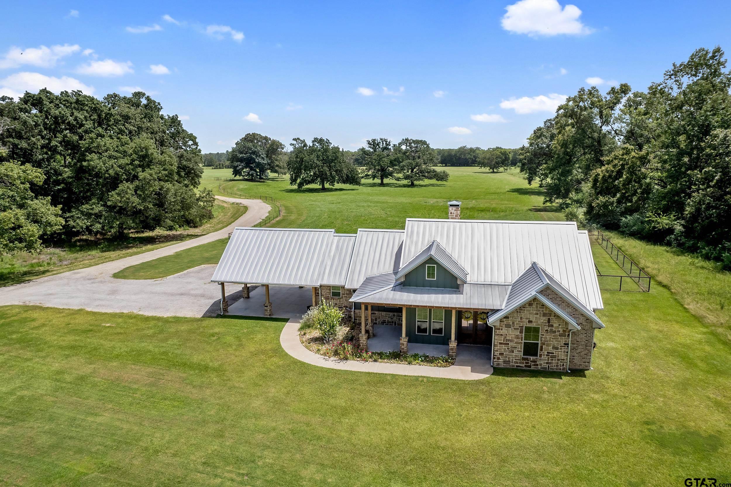 20122 County Road 452 Mineola, TX 75773 - Photo 1 of 41 a view of a house with pool and a yard