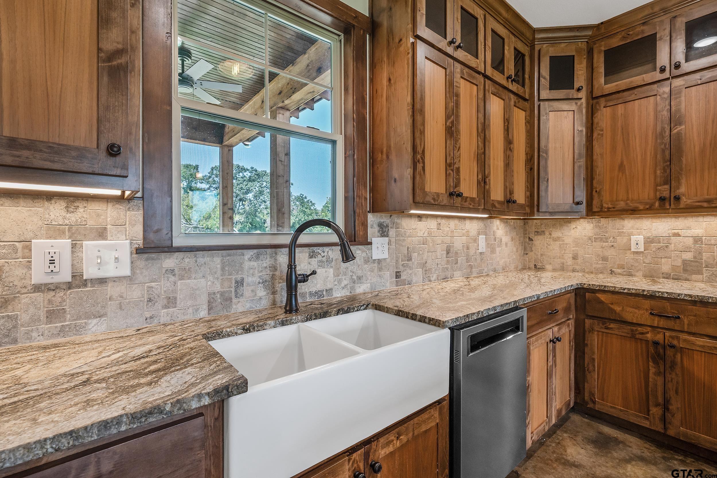 20122 County Road 452 Mineola, TX 75773 - Photo 15 of 41 a kitchen that has a sink and a stove