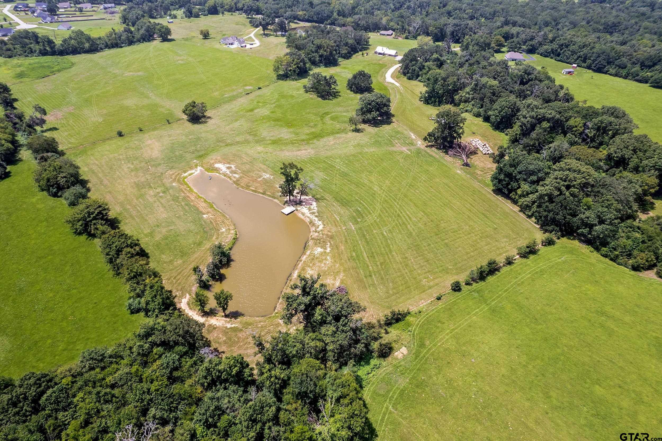 20122 County Road 452 Mineola, TX 75773 - Photo 39 of 41 an aerial view of residential houses with outdoor space