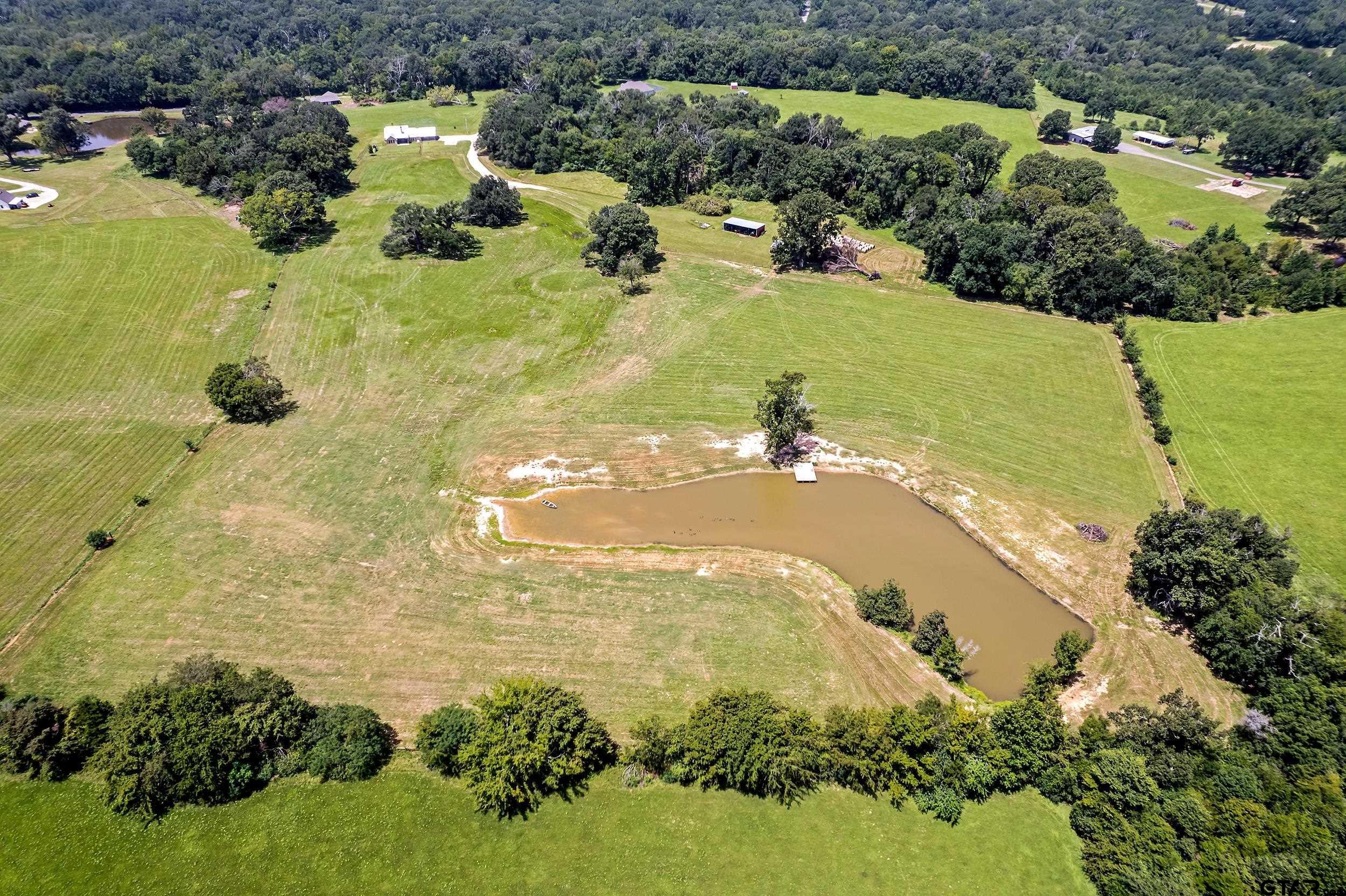 20122 County Road 452 Mineola, TX 75773 - Photo 40 of 41 a view of a lake with a yard
