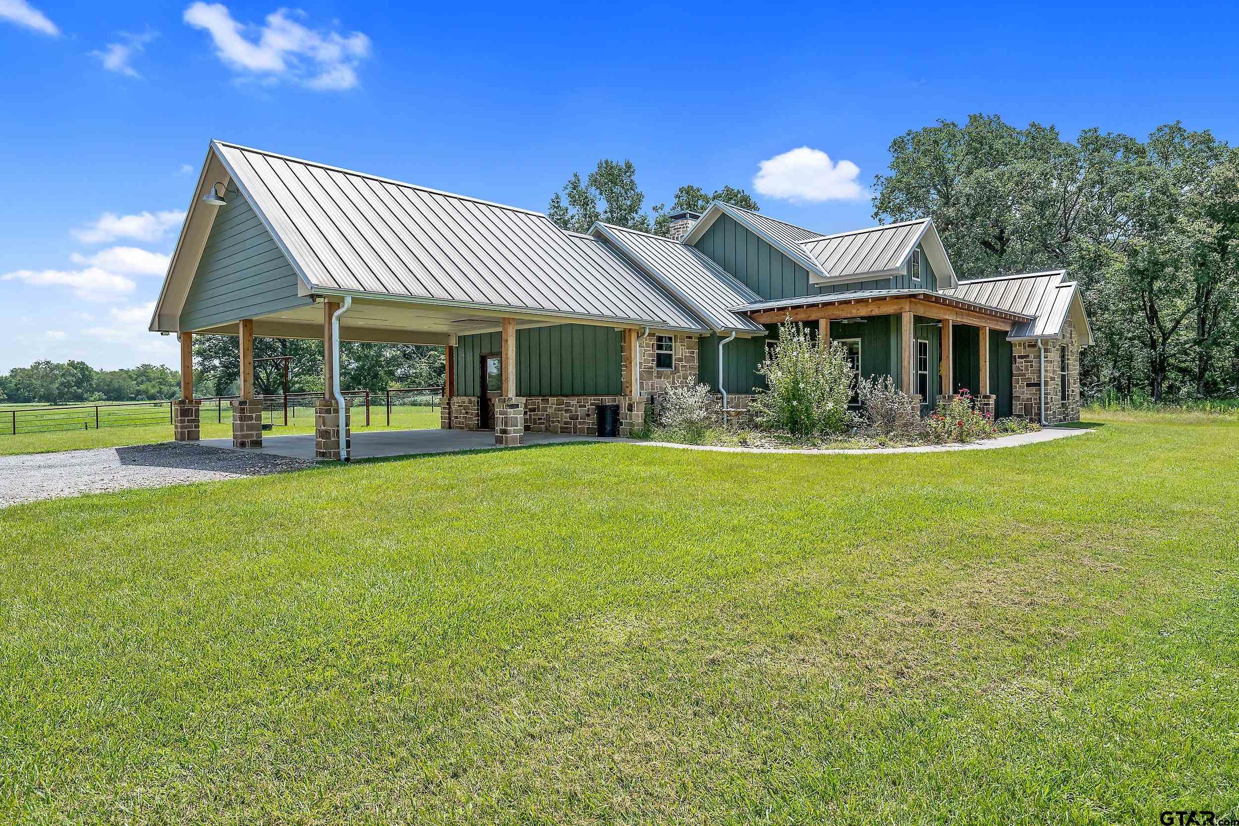 20122 County Road 452 Mineola, TX 75773 - Photo 9 of 41 a front view of house with yard and green space